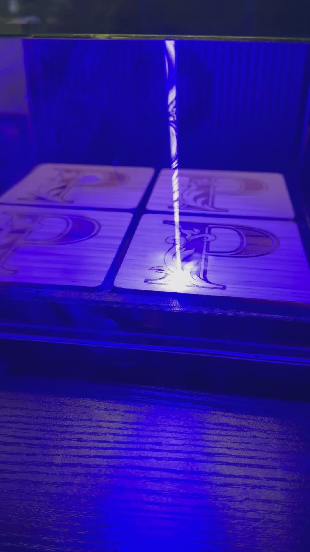 Load video: Laser Engraving Custom Coasters